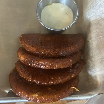 Throwback Tavern - Nashville Mozz Melts- spicy fried mozz in a Nashville hot sauce - Burgers Near Me - Pembroke Pines, Florida Throwback Tavern - Nashville Mozz Melts- spicy fried mozz in a Nashville hot sauce - Burgers Near Me - Pembroke Pines, Florida