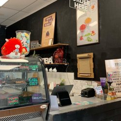 Cute Boba items on the counter and on the walls