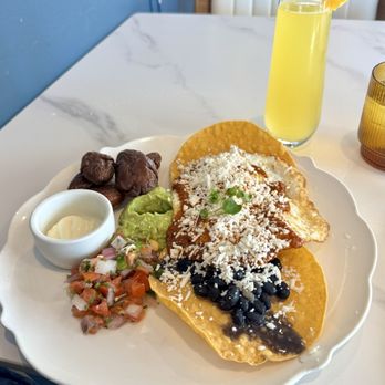 The Royale - Huevos Rancheros & a standard mimosa. - Breakfast & Brunch Near Me - Pleasant Hill, California The Royale - Huevos Rancheros & a standard mimosa. - Breakfast & Brunch Near Me - Pleasant Hill, California