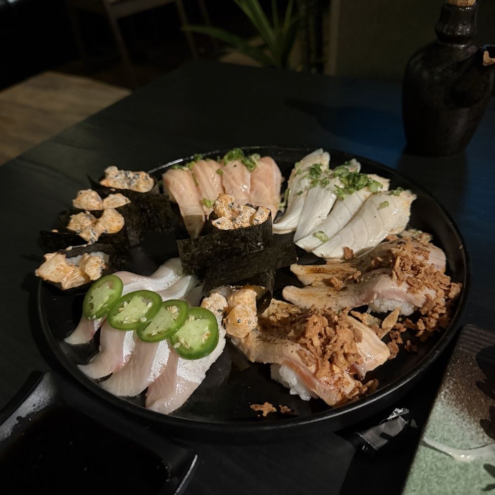 Assorted Nigiri - Salmon Belly, Torched White Tuna, etc. Assorted Nigiri - Salmon Belly, Torched White Tuna, etc.