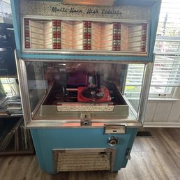 Real working vintage jukebox! Tay will put some quarters out for you to choose the music!