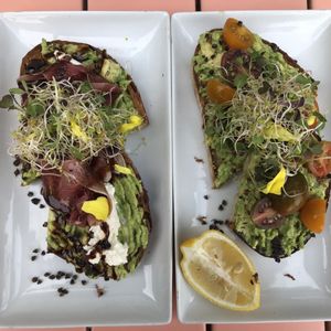 Photo of The Grounds Bean Bar - San Diego, CA, United States. Grounds Avocado Toast, $9 (left) Avocado Toast, $8 (right)