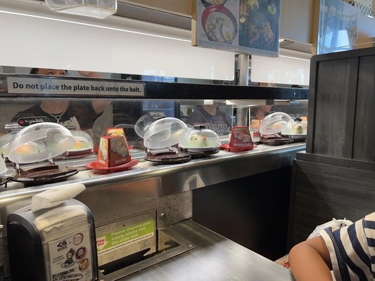 Kura Revolving Sushi Bar by null