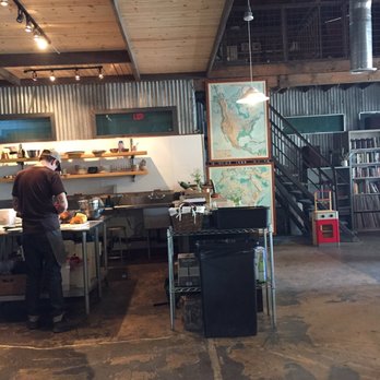 Exo Roast Co - This is their kitchen. Simple, and open to a seating area. You can also read those books! - Coffee Roasteries Near Me - Tucson, Arizona Exo Roast Co - This is their kitchen. Simple, and open to a seating area. You can also read those books! - Coffee Roasteries Near Me - Tucson, Arizona