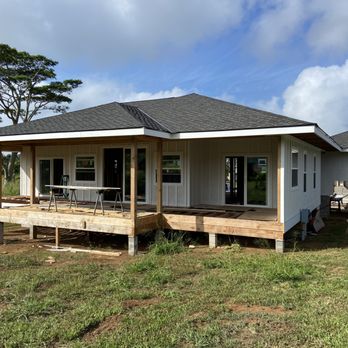 Living Structures - a small house with a porch - General Contractors Near Me Living Structures - a small house with a porch - General Contractors Near Me