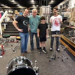 Tommy's Drum Shop - My son with the team.