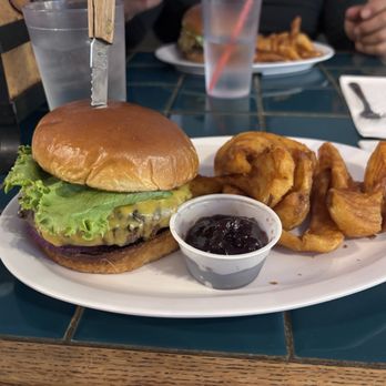 Blakeslee's Bar & Grill - Elk burger with onion jam - Bars Near Me - Forks, Washington Blakeslee's Bar & Grill - Elk burger with onion jam - Bars Near Me - Forks, Washington