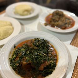 Moji African Restaurant - Efo with beef, chicken, and pounded yam.