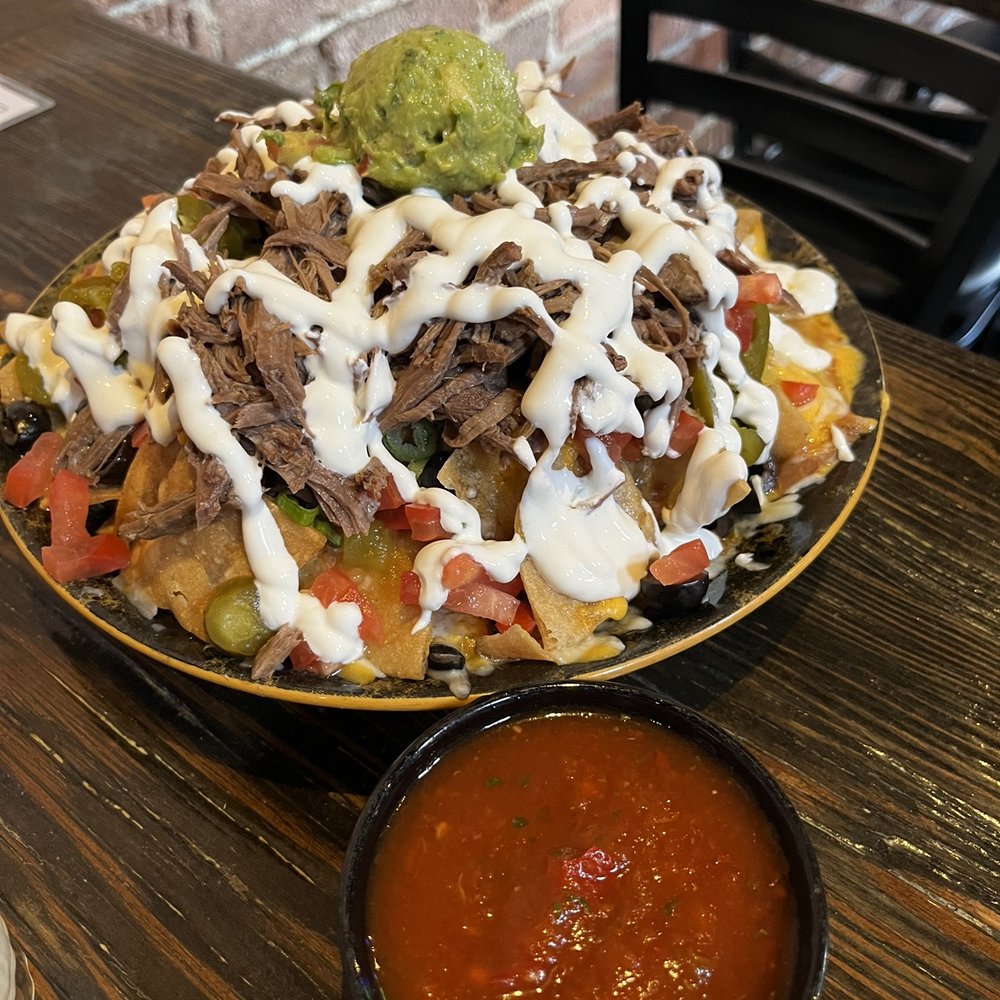 Villa Cantina - Shareable sized Beef Nachos order more guacamole! - Burgers Near Me - Arroyo Grande, California Villa Cantina - Shareable sized Beef Nachos order more guacamole! - Burgers Near Me - Arroyo Grande, California