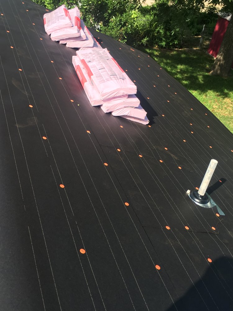 Slide of Mercedes Roofing