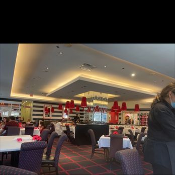 American Girl - a woman in a restaurant - Cafes Near Me - Chicago, Illinois American Girl - a woman in a restaurant - Cafes Near Me - Chicago, Illinois