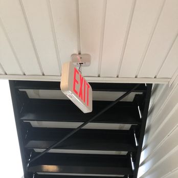 Hawthorne at Smith Creek - Three weeks post hurricane with minimal damage and have yet to repair required EXIT signs - Apartments Near Me - Wilmington, North Carolina