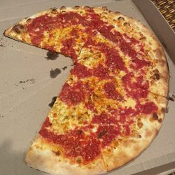 Rhode Island pizza - Mostly sauce cheese pizza.