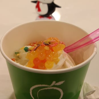 Peachwave - a cup of ice cream with a spoon in it - Ice Cream & Frozen Yogurt Near Me - Lenexa, Kansas Peachwave - a cup of ice cream with a spoon in it - Ice Cream & Frozen Yogurt Near Me - Lenexa, Kansas