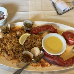 Lobster fisherman's platter with scallops, shrimp, clams and rice