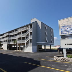 Regatta Rentals & Sales - Front of the condos, from the street.