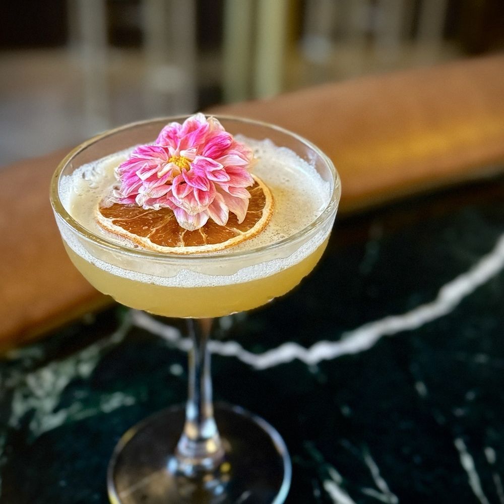 Custom crafted cocktail by the bartender Custom crafted cocktail by the bartender