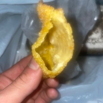 Lincoln Garden - a hand holding a half eaten lemon - Chinese Near Me - Evansville, Indiana Lincoln Garden - a hand holding a half eaten lemon - Chinese Near Me - Evansville, Indiana