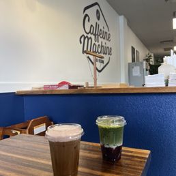 White chocolate cold brew with strawberry cold foam and blackberry cobbler matcha