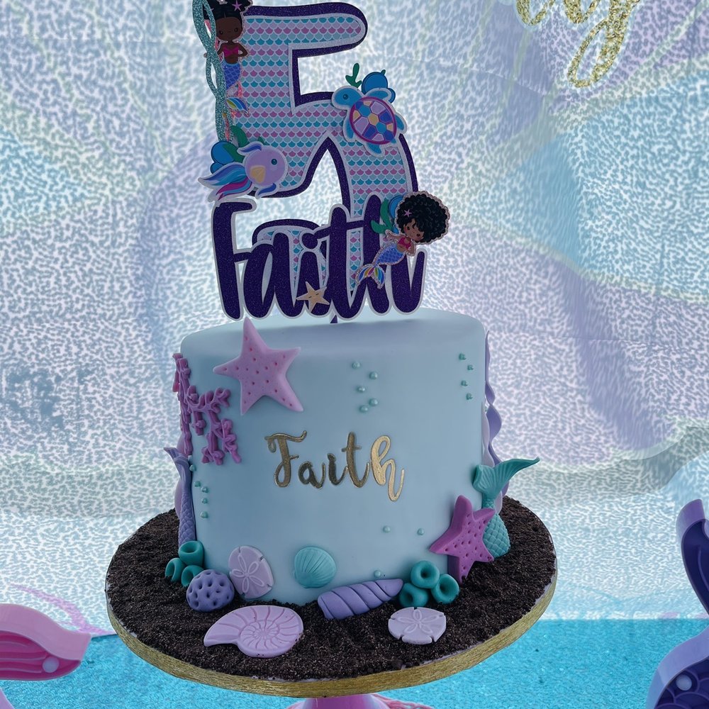 a cake with a number 5 on it a cake with a number 5 on it