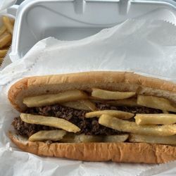 Hangry Bites - Philly cheesesteak with fries on it.