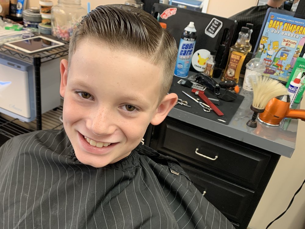 Damm’s Barbershop Logo