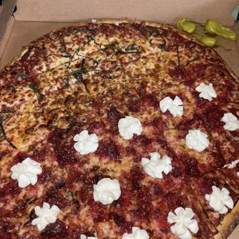 Novel Pizza Cafe - Top half is cheese & garlic Bottom half is ricotta, garlic & longanisa - Pizza Near Me - Chicago, Illinois Novel Pizza Cafe - Top half is cheese & garlic Bottom half is ricotta, garlic & longanisa - Pizza Near Me - Chicago, Illinois