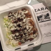Photo of Zara Afghan Cuisine - Sacramento, CA, United States. Lamb over rice, taste good but feel they skimmed on the rice and salad :/