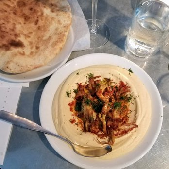 Mediterranean Exploration - The hummus “pitriyot” with maitake mushrooms, paprika, and dill at Mediterranean Exploration Company - Mediterranean Near Me - Portland, Oregon