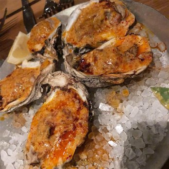 Cochon RESTAURANT - Wood-Fire Oysters with Chili Garlic Butter - Cajun/Creole Near Me - New Orleans, Louisiana Cochon RESTAURANT - Wood-Fire Oysters with Chili Garlic Butter - Cajun/Creole Near Me - New Orleans, Louisiana