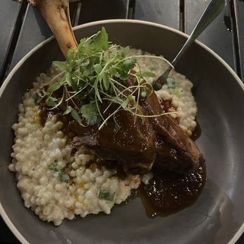 The Artisan's Palate - Lamb shank with couscous - Cafes Near Me - Charlotte, North Carolina The Artisan's Palate - Lamb shank with couscous - Cafes Near Me - Charlotte, North Carolina