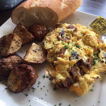 Starling Diner - Bacon and cheddar eggs- comes with potatoes and a soft baguette! Mhmmm! - New American Near Me - Long Beach, California Starling Diner - Bacon and cheddar eggs- comes with potatoes and a soft baguette! Mhmmm! - New American Near Me - Long Beach, California