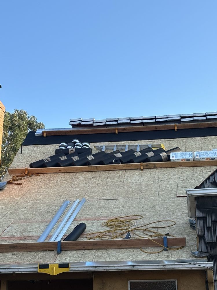 Slide of Maciel Roofing Construction