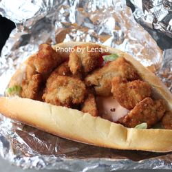 Nassau Street Seafood & Produce - Oyster Po'Boy Torpedo ($17) - roll, lettuce, tomato, homemade roasted pimento mayo, and fried oysters