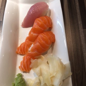 Sushi Kawa - a plate of sushi with chopsticks - Japanese Near Me - Vernon, British Columbia