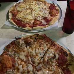Riverview Restaurant - One Pepperoni in the back mushroom pizza in front outstanding and delicious