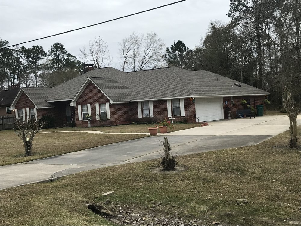 Slide of Plunkett Roofing