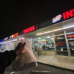 Outside the spot with my two breakfast burritos hahaha