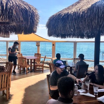 Duke's Malibu - Palapa shaded tables on the patio, overlooking the ocean - New American Near Me - Malibu, California Duke's Malibu - Palapa shaded tables on the patio, overlooking the ocean - New American Near Me - Malibu, California