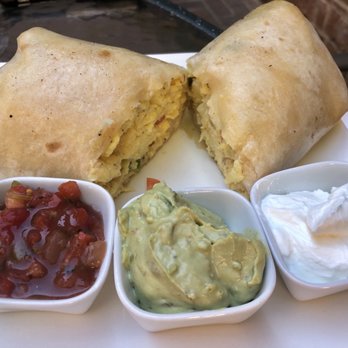 The Bickering Sisters - Breakfast burrito!! Loved that avocado spread sauce in the center there! - New American Near Me - Ogden, Utah The Bickering Sisters - Breakfast burrito!! Loved that avocado spread sauce in the center there! - New American Near Me - Ogden, Utah