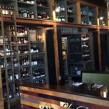 Merchant - "bourgeois" liquor store attachment - Cocktail Bars Near Me - Madison, Wisconsin
