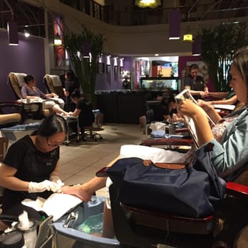 Myano Nails & Spa - Cathy going hard in the paint on Julia's pregnancy feet - Skin Care Near Me - Seattle, Washington