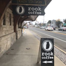 a sign for a little silver train station