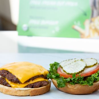 Burger Boss - two burgers with cheese, tomato, and lettuce - Burgers Near Me - Mission Viejo, California Burger Boss - two burgers with cheese, tomato, and lettuce - Burgers Near Me - Mission Viejo, California