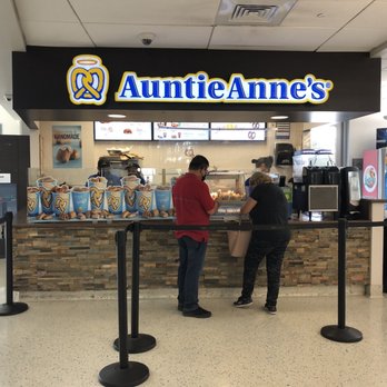 Auntie Anne's - two people at the counter - Pretzels Near Me - Saint Cloud, Florida