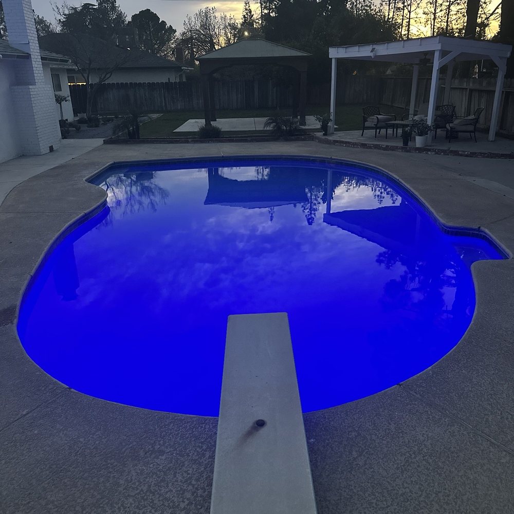 Allegiant pool tile cleaning and plastering - Pool with light on - Pressure Washers Near Me - Clovis, California Allegiant pool tile cleaning and plastering - Pool with light on - Pressure Washers Near Me - Clovis, California