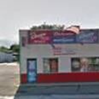 Cheers To You - a view of a restaurant across the street - Sports Bars Near Me - Midvale, Utah