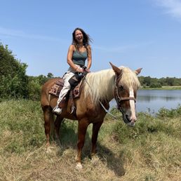 Single rider by the pond Single rider by the pond