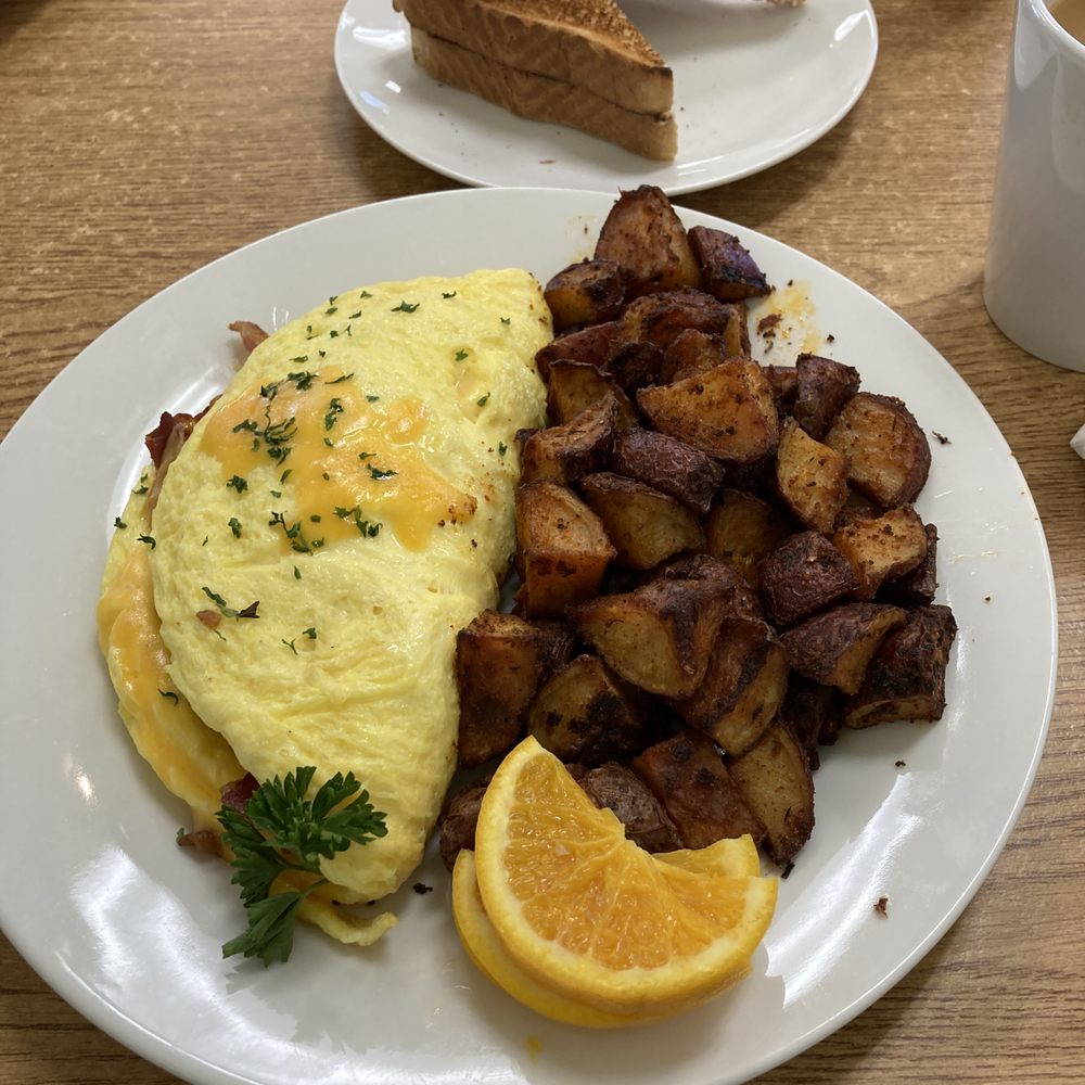 Sha Swirl Cafe & Bakery - Bacon Cheese Omelet with seasoned home fries - Bakeries Near Me - Galloway, New Jersey Sha Swirl Cafe & Bakery - Bacon Cheese Omelet with seasoned home fries - Bakeries Near Me - Galloway, New Jersey