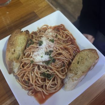 Fat Tony's Pizzeria - So good, fresh garlic bread, fresh basil and grated parm. The meat sauce was hearty. - Pizza Near Me - Bend, Oregon Fat Tony's Pizzeria - So good, fresh garlic bread, fresh basil and grated parm. The meat sauce was hearty. - Pizza Near Me - Bend, Oregon